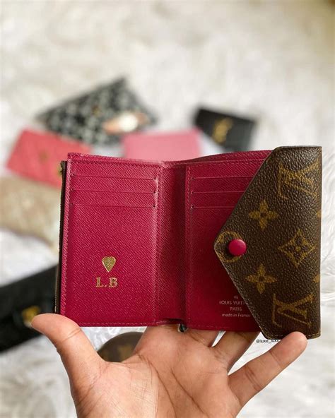 lv wallet hot stamp